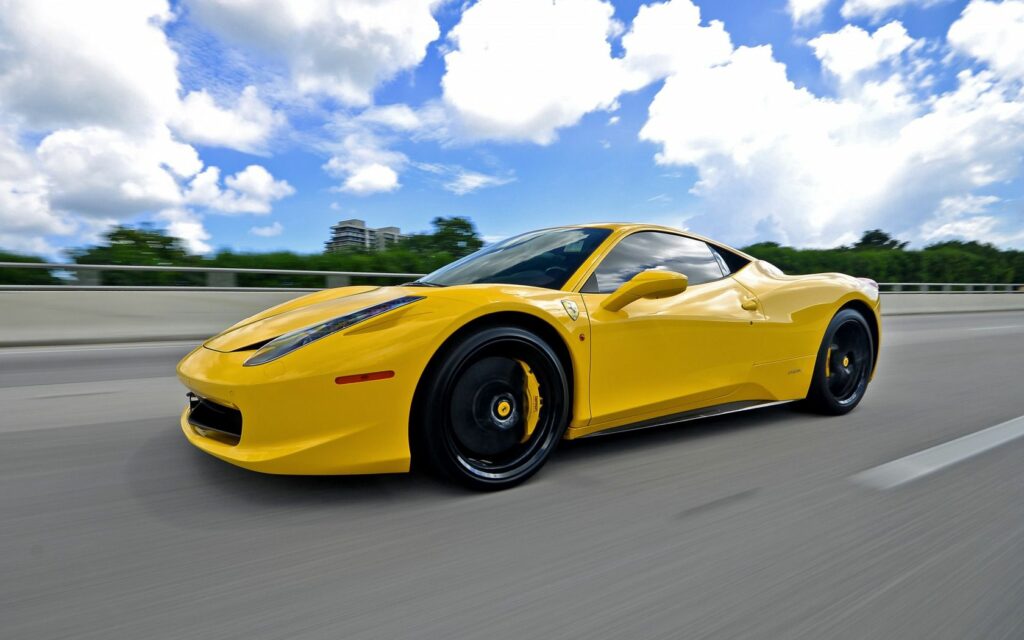 Vibrant Yellow Ferrari 458 Italia in Motion - Stunning Wallpaper
