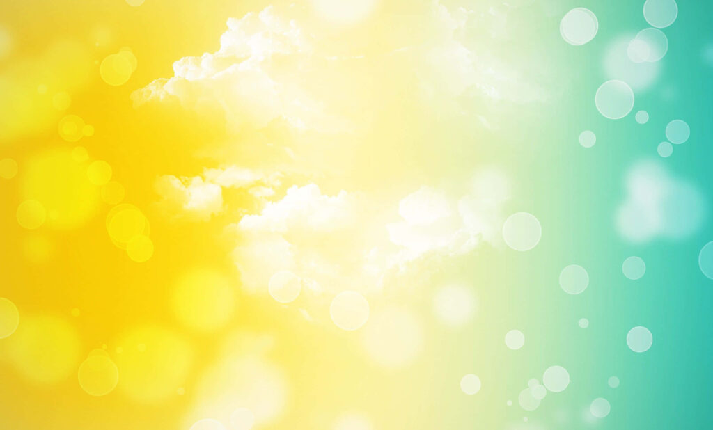 Vibrant Yellow and Green Abstract Wallpaper with Bokeh and Clouds