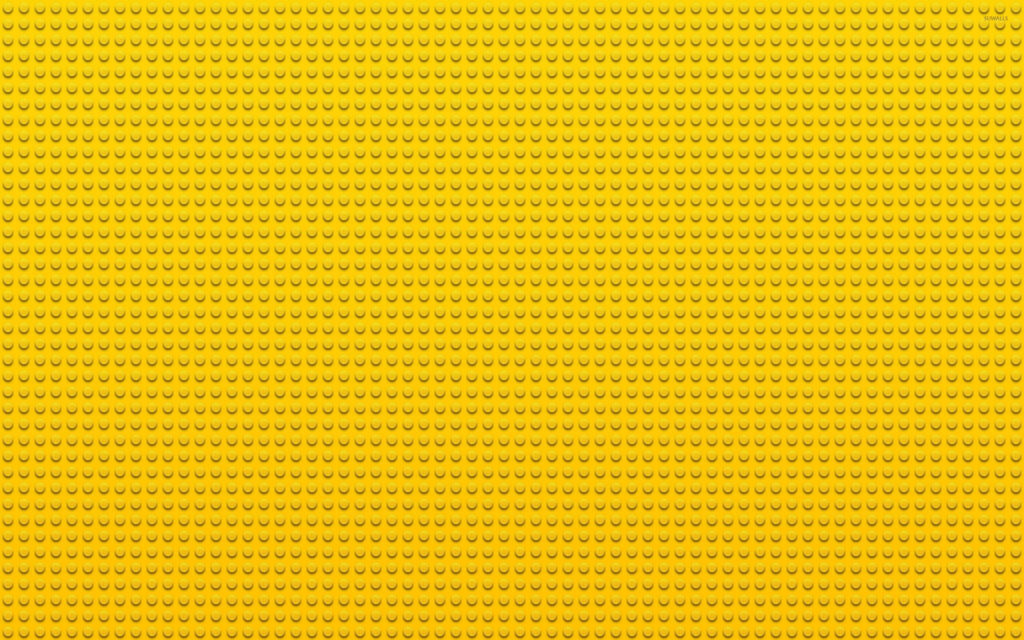 Playful Yellow Interlocking Studs Wallpaper – Abstract Background