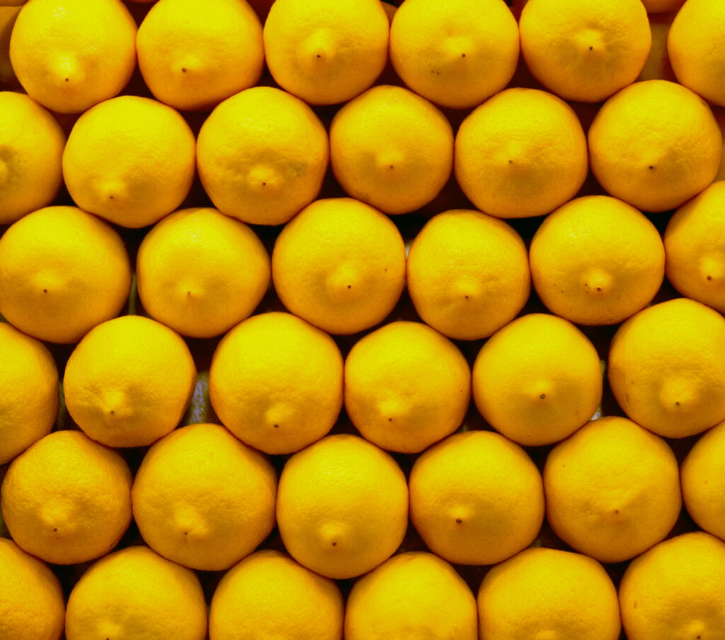 Vibrant Yellow Lemon Wallpaper - Fresh Citrus Symmetrical Background