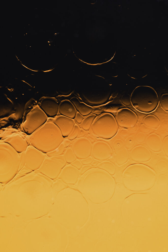 Vibrant Yellow Liquid Bubbles Abstract Wallpaper for Dynamic Background