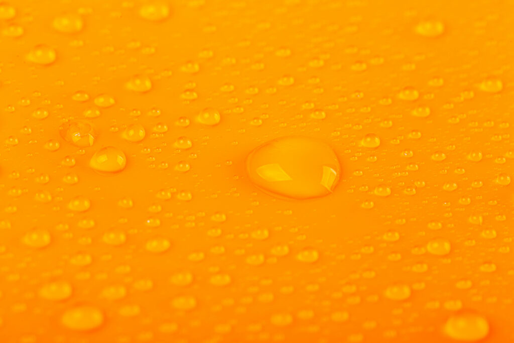 Vibrant Yellow Liquid Macro: Glossy Droplets Wallpaper Background