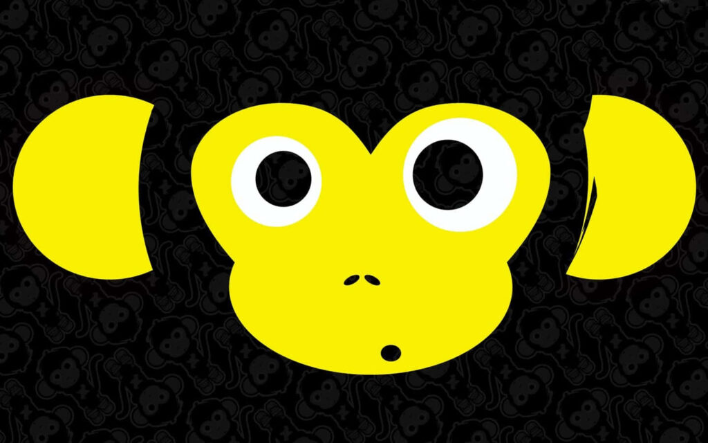 Vibrant Yellow Monkey Face Wallpaper: Playful Minimalist Design