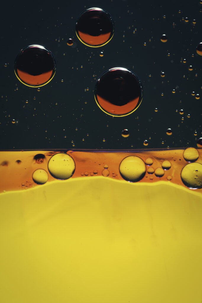 Vibrant Yellow & Orange Bubble Wallpaper with Dark Background
