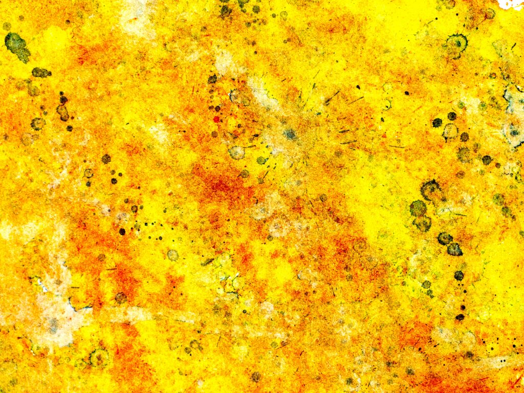 Vibrant Yellow Paint Splash Wallpaper for Energetic Backgrounds