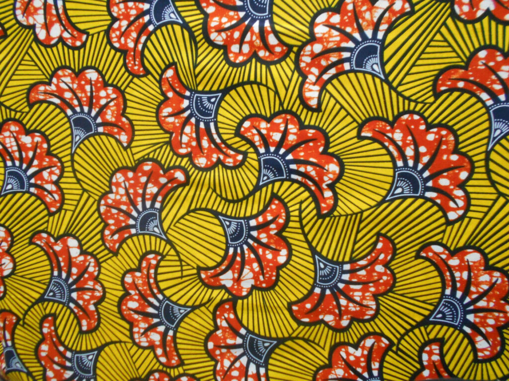 Vibrant Wax Fabric Wallpaper: Colorful Floral & Geometric Design
