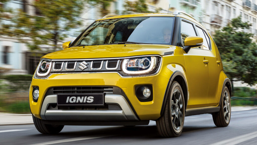 Vibrant Yellow Suzuki Ignis Wallpaper: Sleek Urban Design