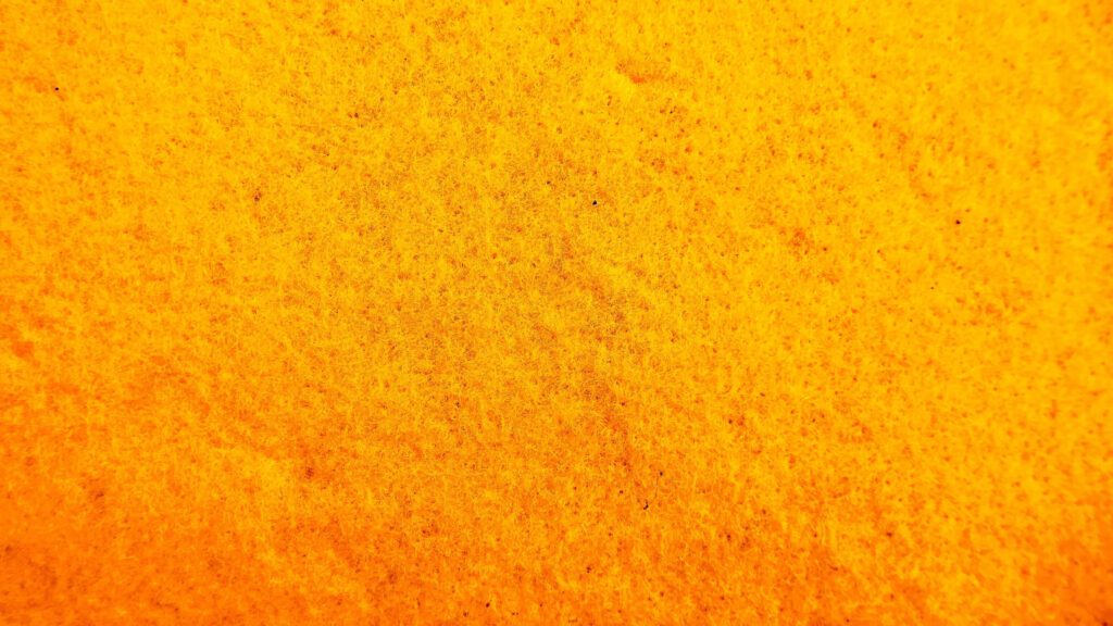 Vibrant Yellow Textured Wallpaper: Bright & Captivating Design