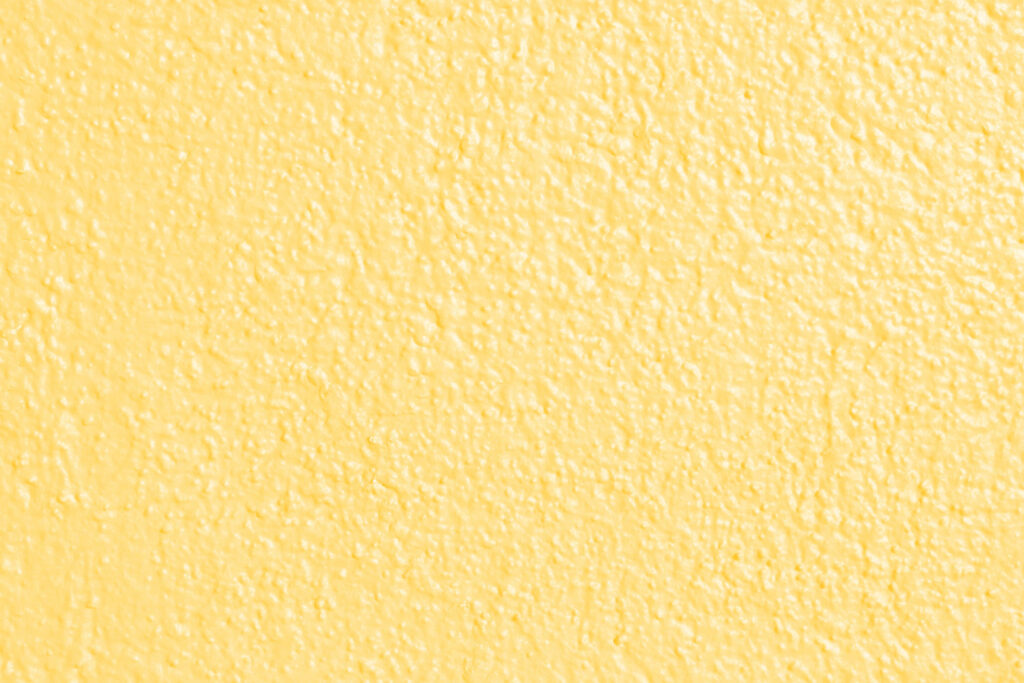 Vibrant Yellow Textured Wallpaper: Energizing Background Design