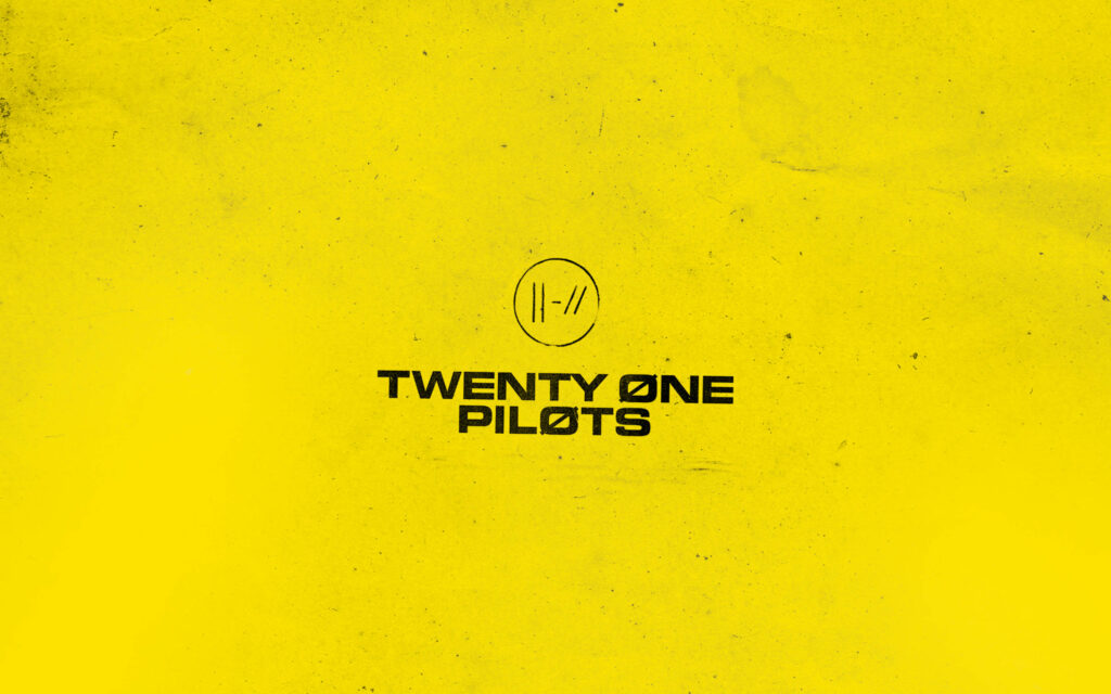 Minimalist Yellow Wallpaper with Twenty One Pilots Logo & Bold Design