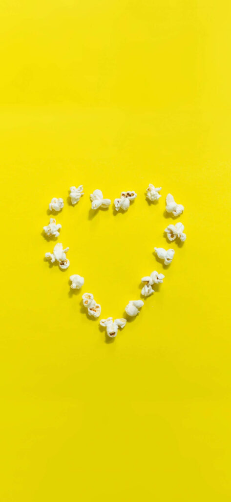 Cheerful Yellow Wallpaper with Popcorn Heart Shape Design