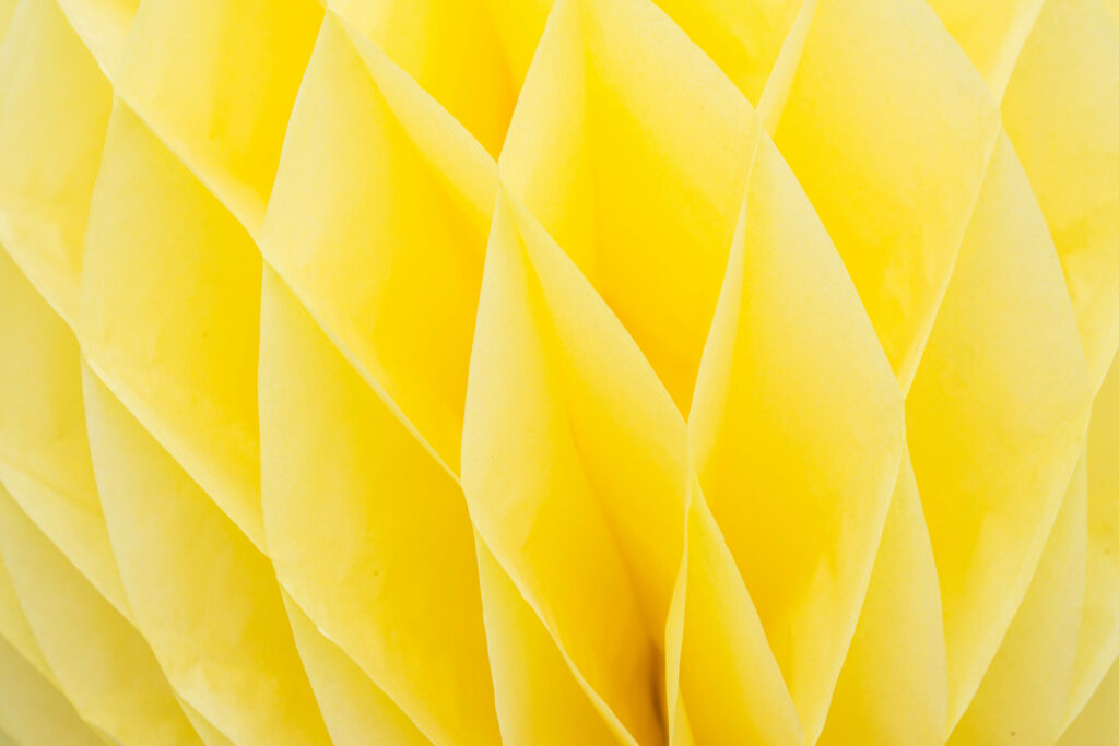 Vibrant Yellow Wallpaper with Mesmerizing Folded Textures Background