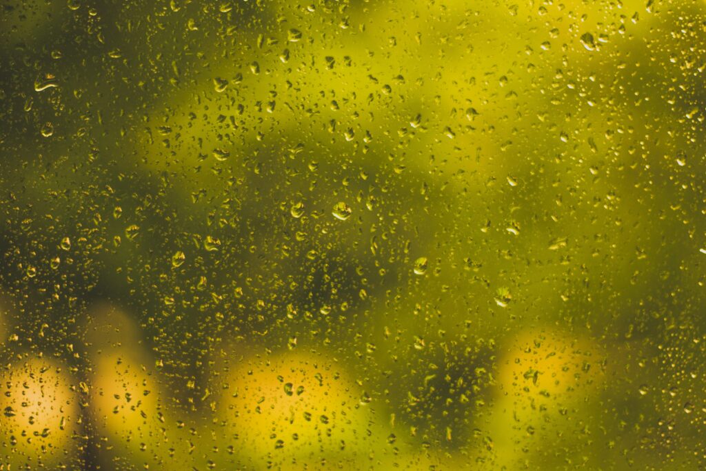 Artistic Yellow Water Droplets Wallpaper Background