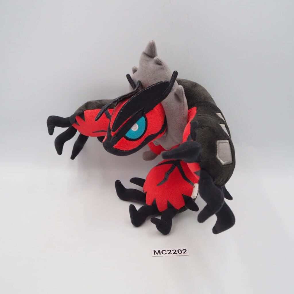 Vibrant Yveltal Plush Toy on White Background - Detailed Design Showcase Wallpaper