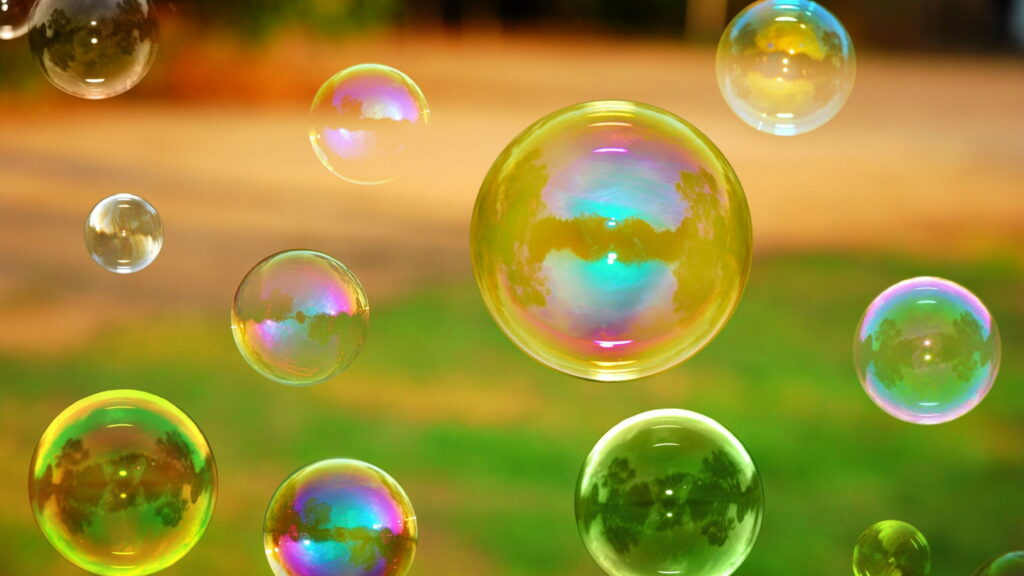 Vibrant Bubble Wonderland: Transparent Background QHD Wallpaper with Colorful Bubbles