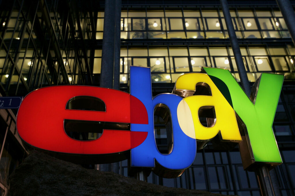eBay logo wallpaper with vibrant colors on modern glass office background online marketplace
