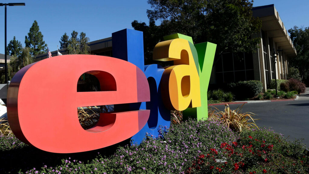 eBay wallpaper with multicolored logo outdoors modern office greenery flowers vibrant background