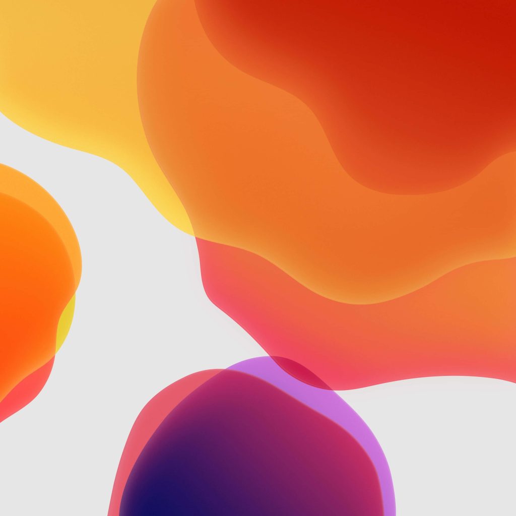 Official iOS 13 wallpaper with vibrant red orange yellow purple fluid abstract shapes on gray