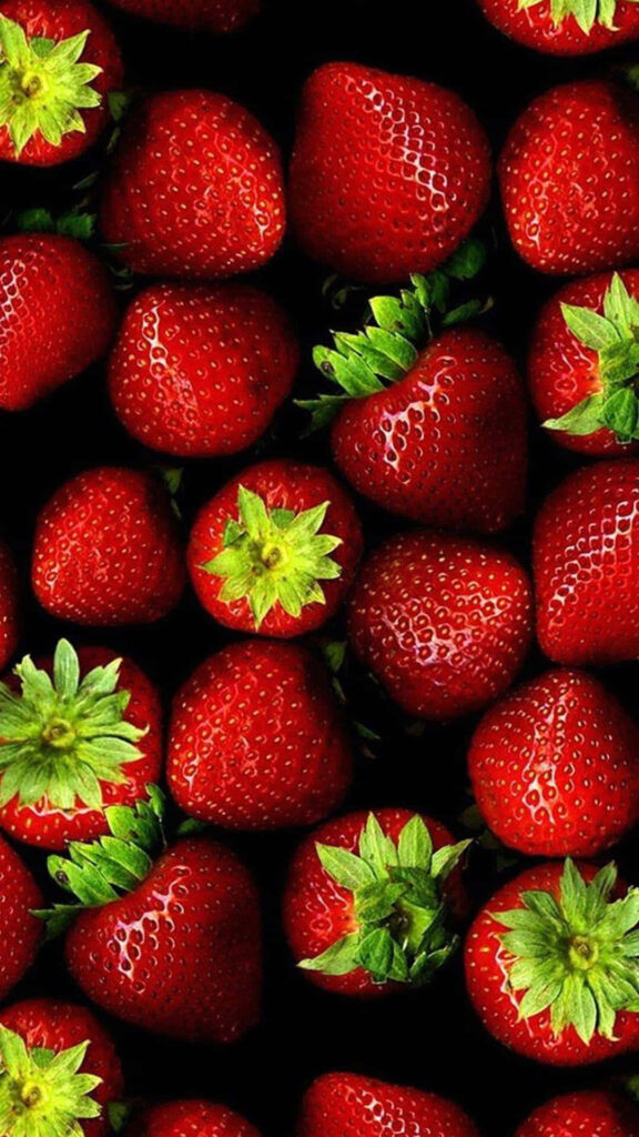 Juicy Strawberry iPhone Wallpaper: Vibrant Red & Green Background