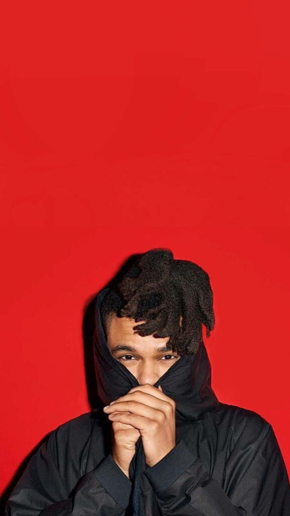 Striking The Weeknd iPhone Wallpaper on Bold Red Background