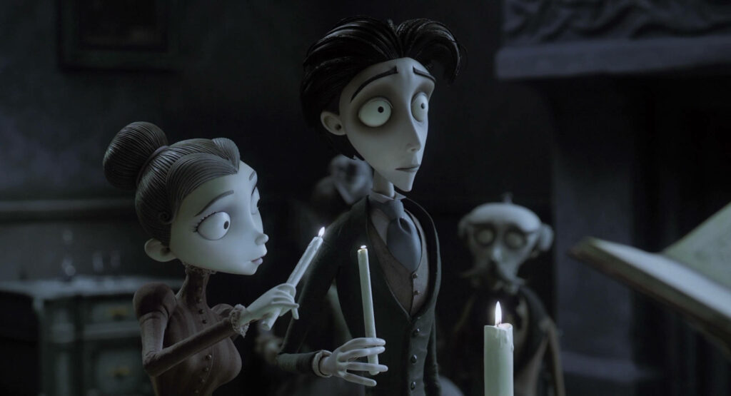 Victor Van Dort and Victoria Everglot holding candles in gothic Corpse Bride scene blue-gray tones Wallpaper