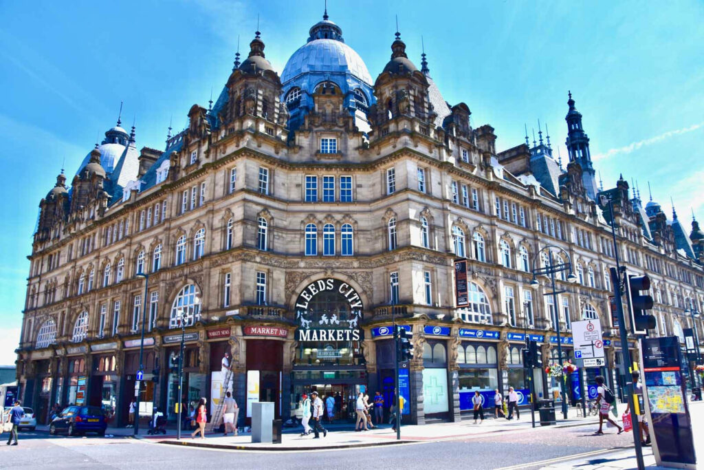 Victorian Leeds Kirkgate Market Wallpaper: Vibrant UK Marketplace Scene