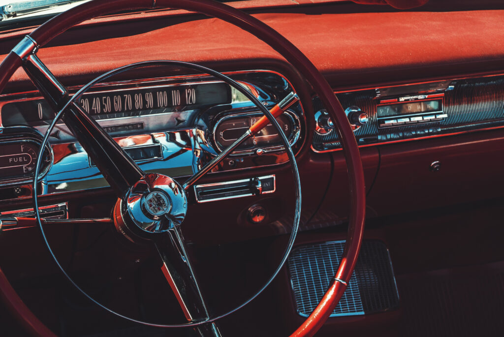 Vintage Car Interior Wallpaper: Classic Steering Wheel & Speedometer