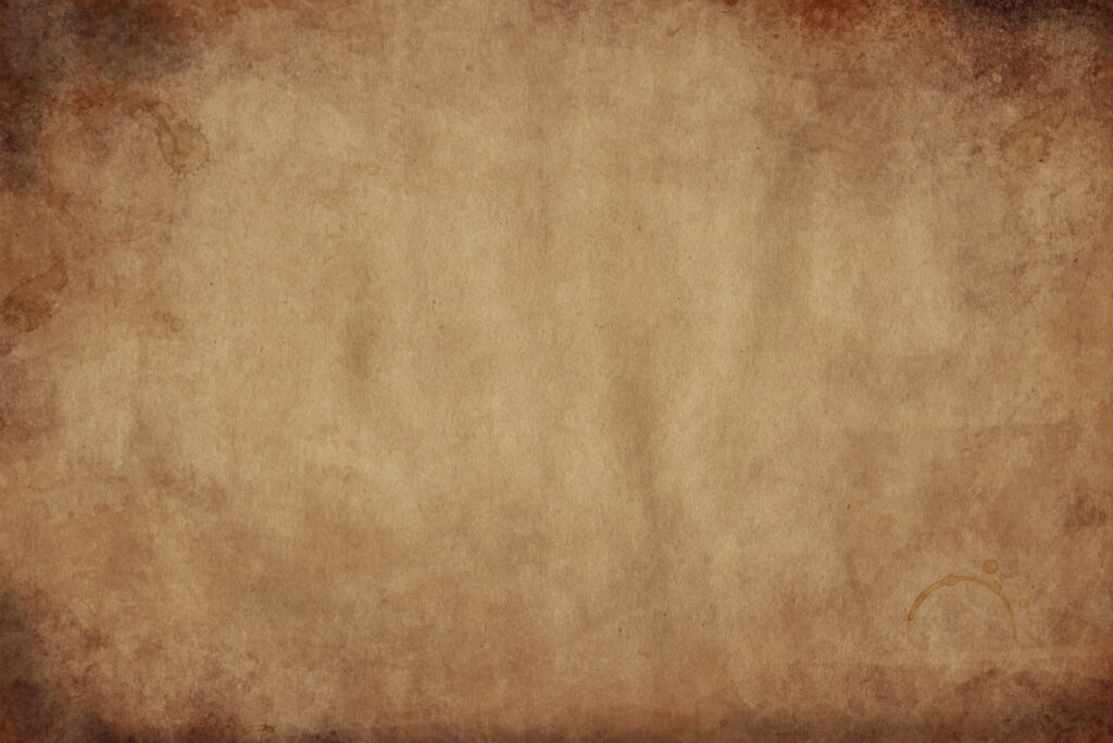 Vintage rustic old paper texture wallpaper with coffee stains and warm sepia tones background