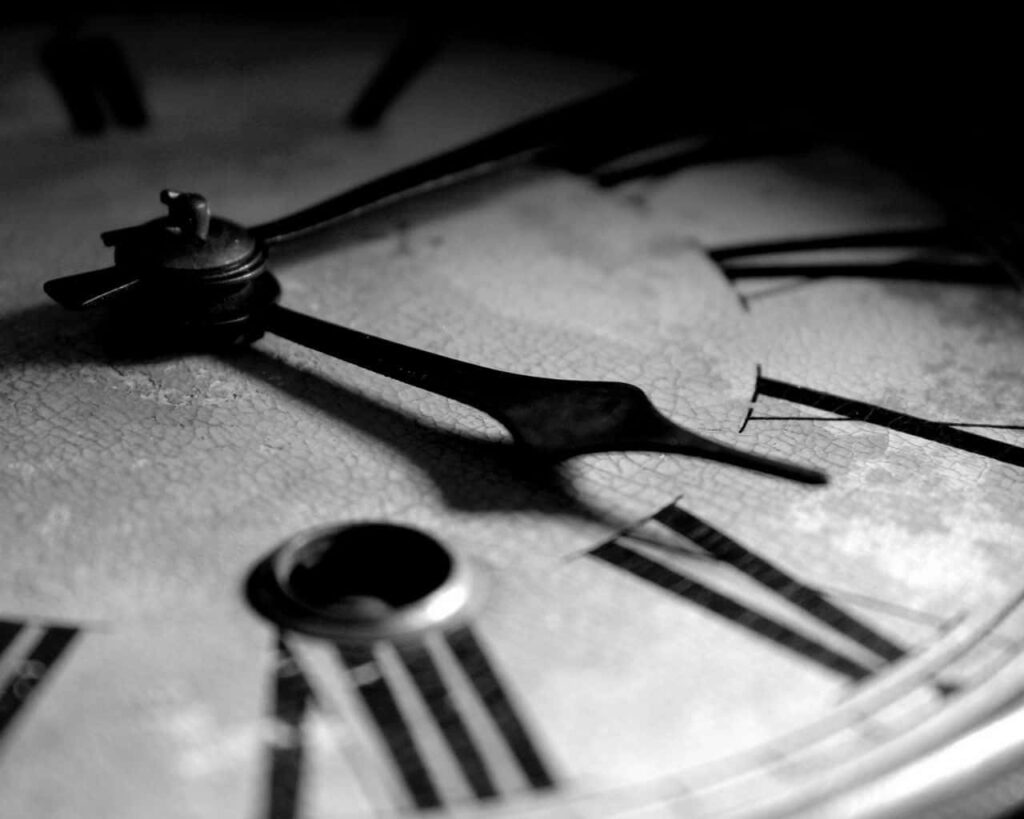 Vintage Clock Face Wallpaper: Intricate Monochrome Background