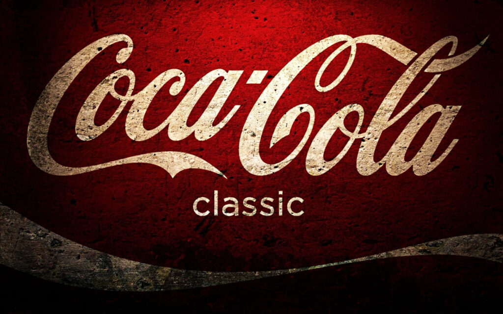 Vintage Coca Cola logo wallpaper with white script on textured deep red retro background