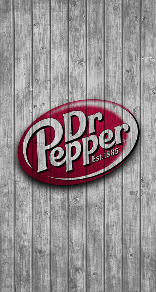Vintage Dr Pepper logo in white on red oval with rustic gray wooden plank background wallpaper
