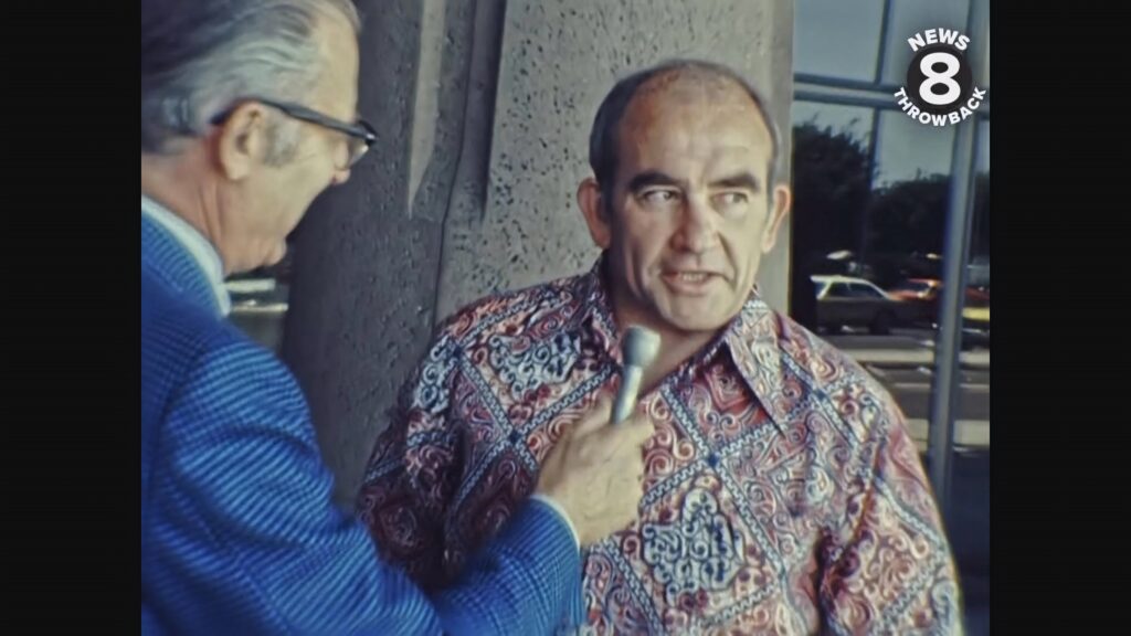 Vintage Ed Asner interview wallpaper retro news broadcast fashion grainy film texture background