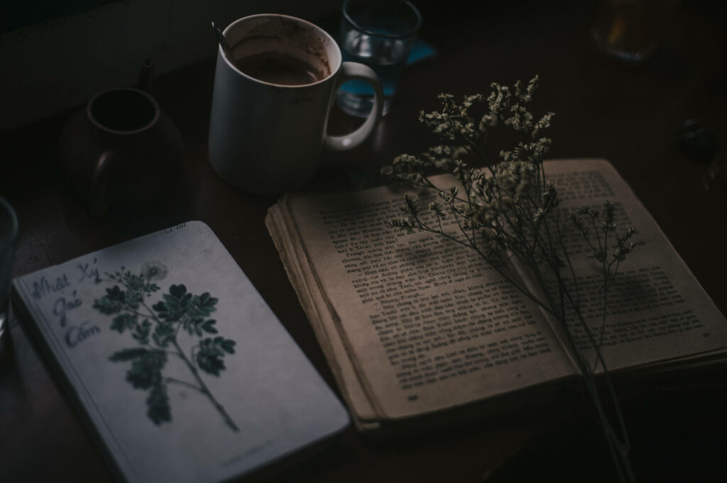 Serenity in Shadows: A Dark Academia Desktop Journey through Coffee, Writing, and Literary Sprigs Wallpaper