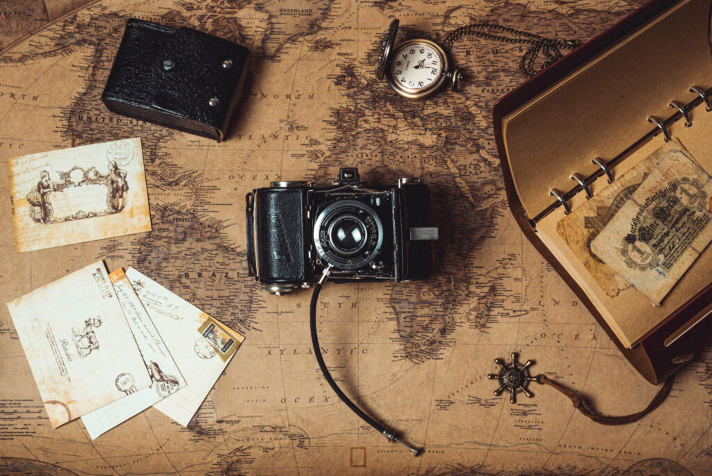 Vintage Navigation: Capturing the Adventure in High-Resolution 4K - Camera and Old World Map Wallpaper