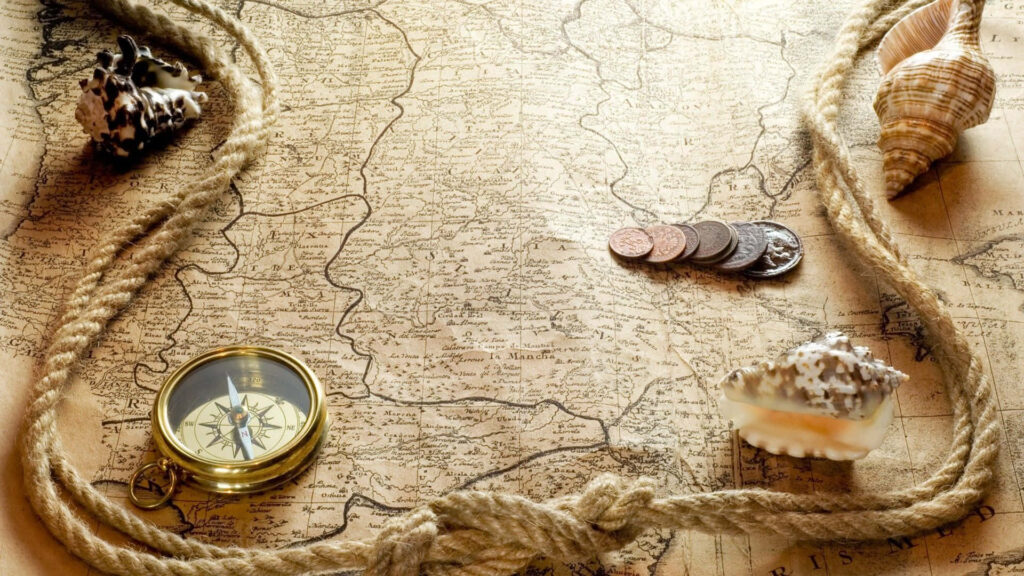 Vintage wallpaper with antique map compass seashells coins and rope in earthy sepia tones