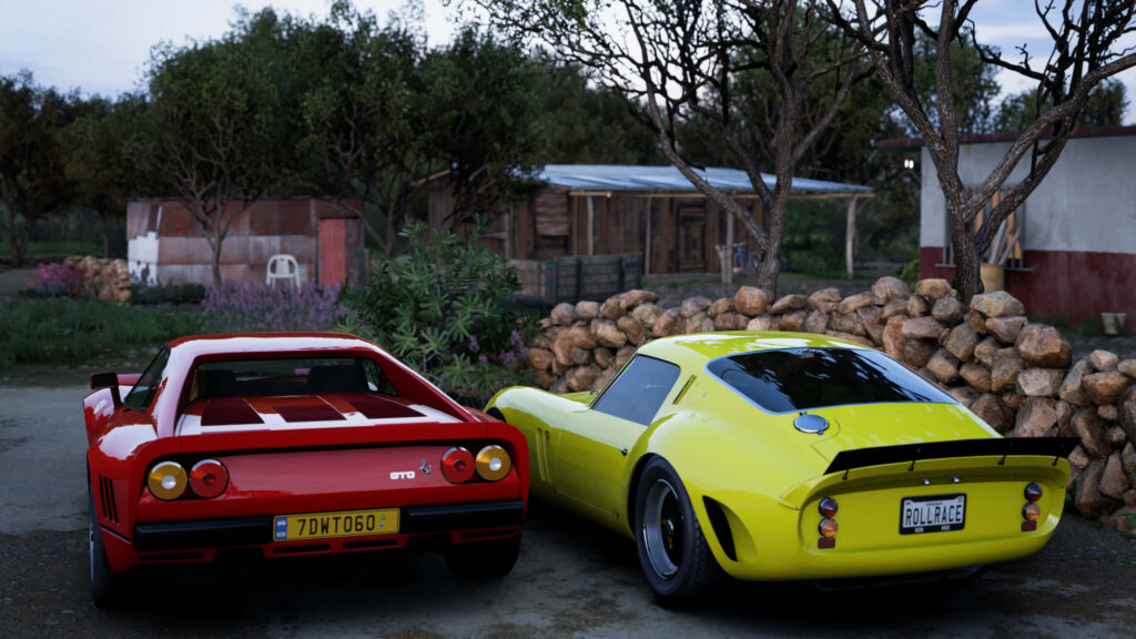 Vintage Ferrari Duo Embellishing a Sunlit Backyard Wallpaper