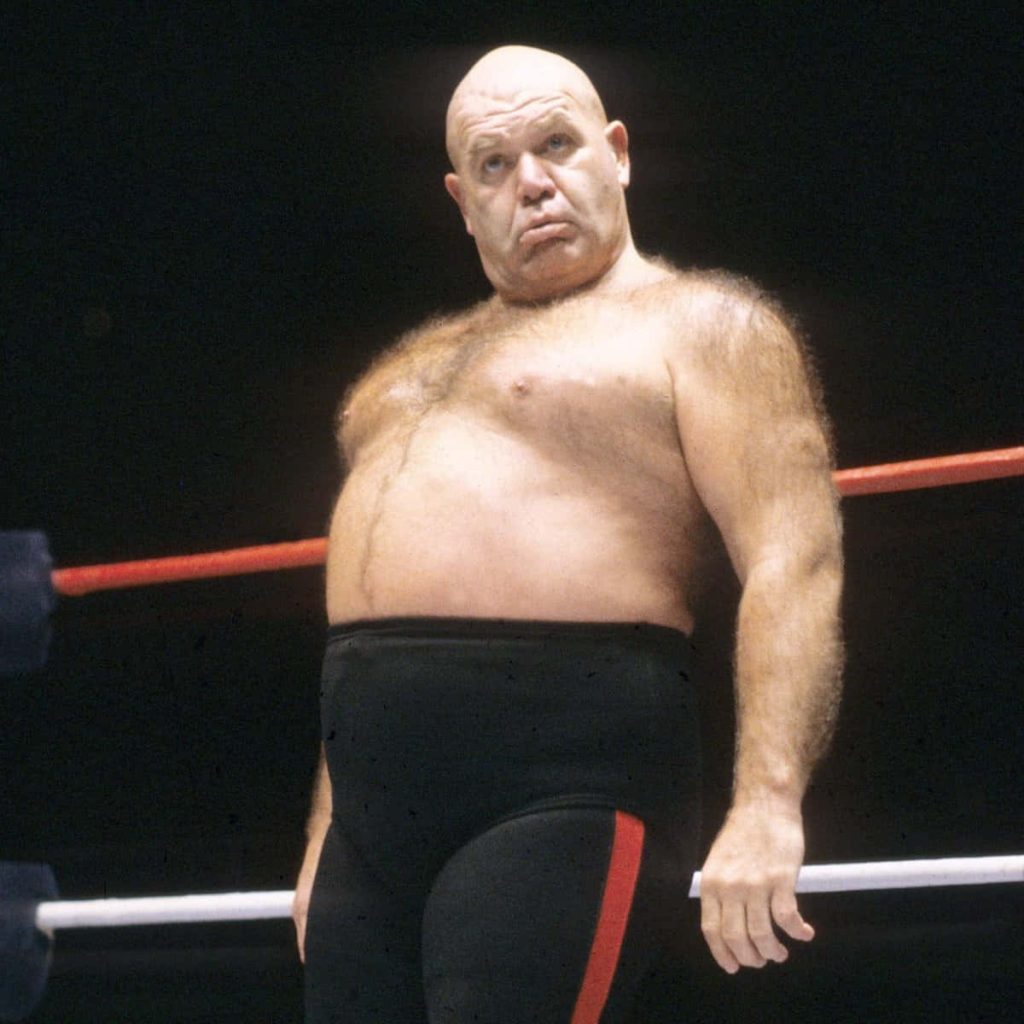 Vintage George The Animal Steele WWE wrestling wallpaper with signature hairy torso and trunks