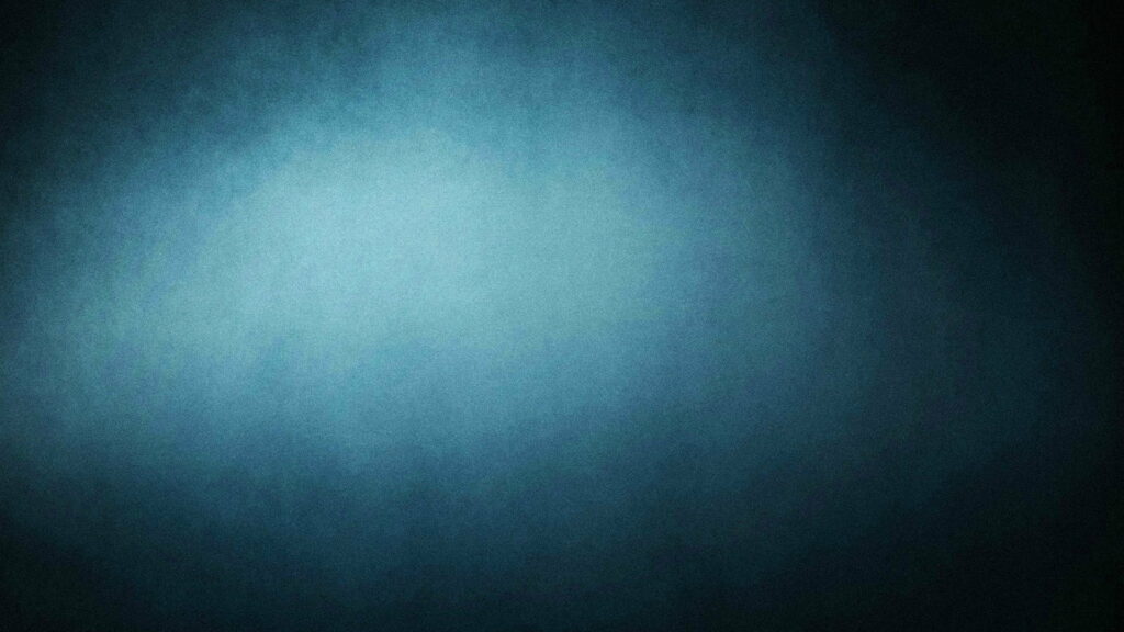 Mystic dark blue grunge wallpaper with textured canvas and soft spotlight vignette background