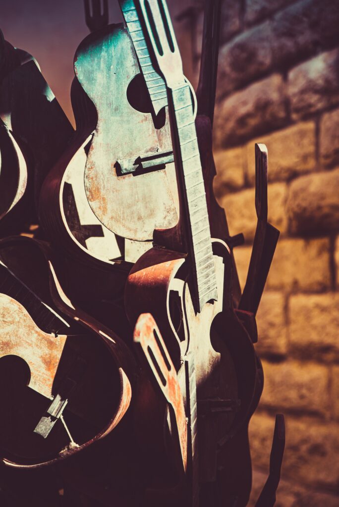 Rustic Wooden Guitars Wallpaper: Vintage Charm & Warm Tones