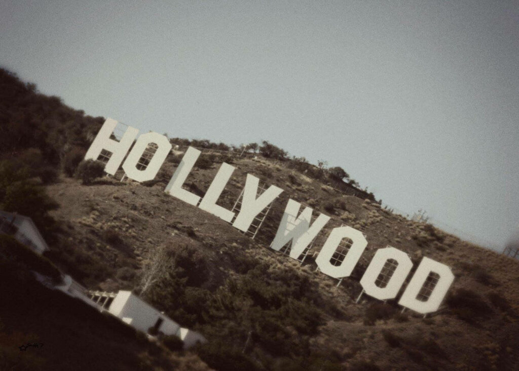 Vintage Hollywood Sign Wallpaper: Classic Charm on Rugged Hillside