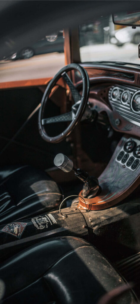 Sleek Vintage Hot Rod Wallpaper: Retro Car Interior Design