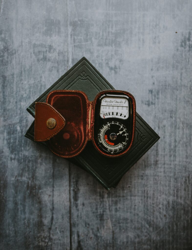 Vintage Measuring Instrument Wallpaper with Rustic Leather Design