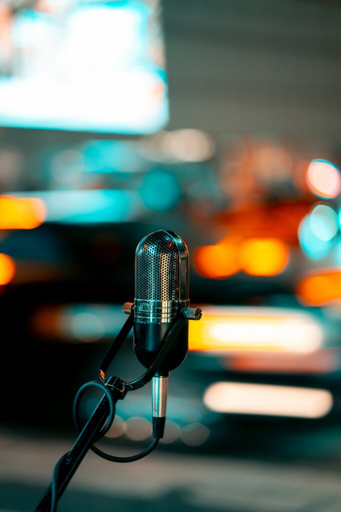 Vintage Microphone Wallpaper: Vibrant Blurred Lights Background