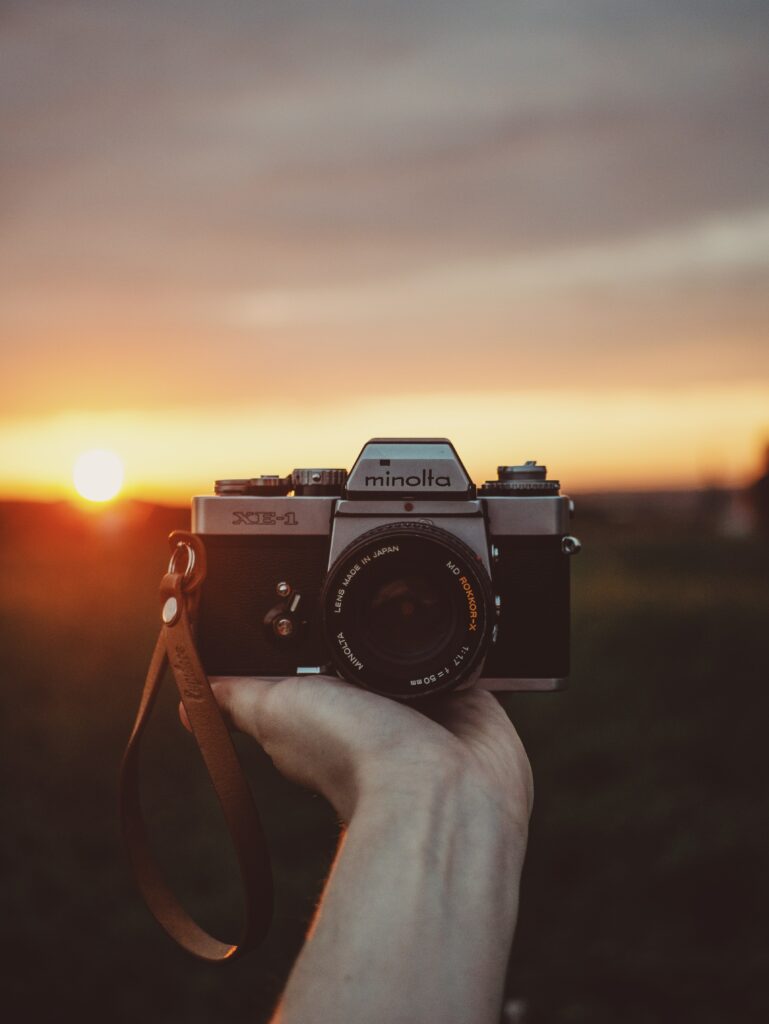 Stunning Sunset with Vintage Minolta Camera - Photography Wallpaper