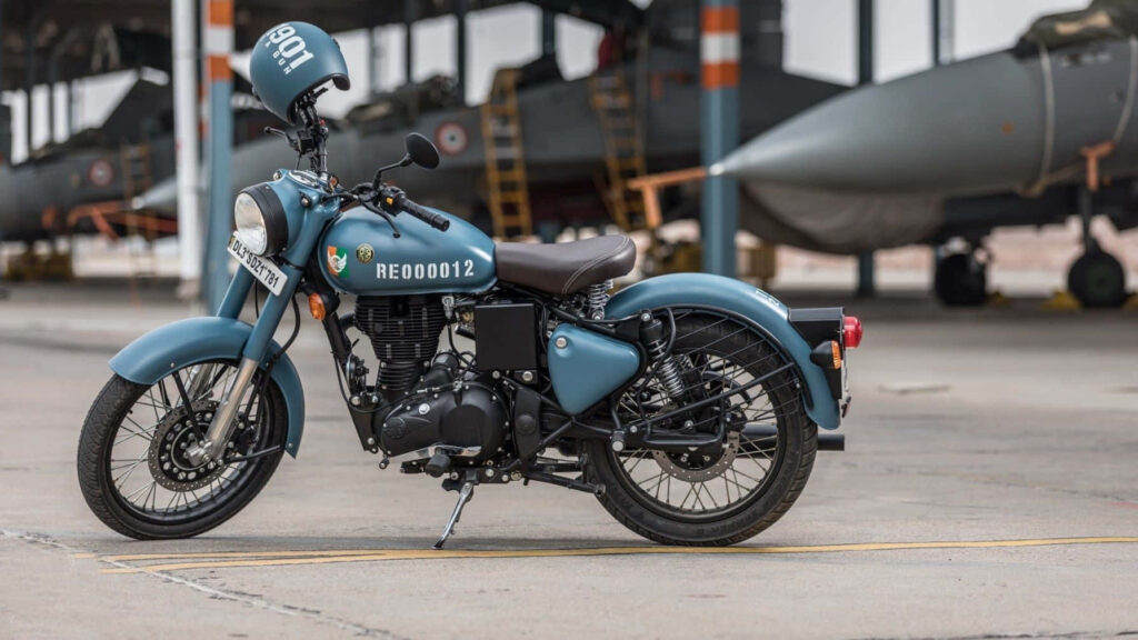 Vintage Motorcycle at Airbase: Classic Rugged Aviation Wallpaper