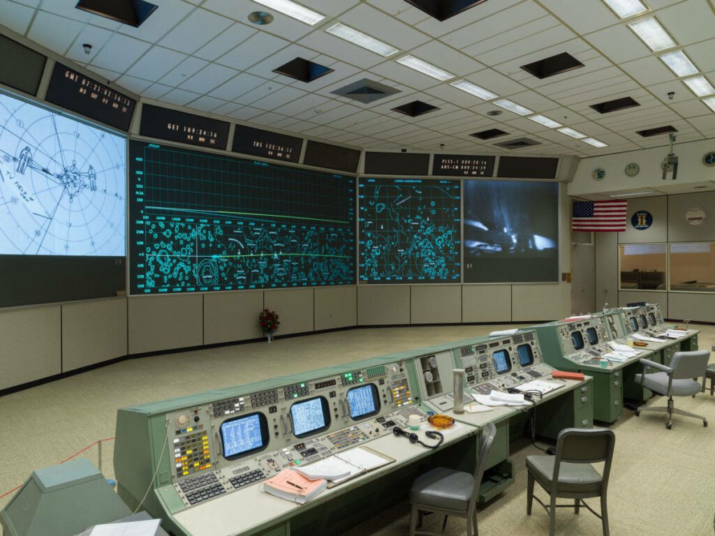 Vintage NASA Control Room: Early Space Mission Tech Wallpaper