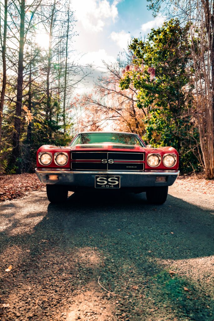Vintage Red Car Wallpaper: Classic Design & Nostalgic Autumn Background
