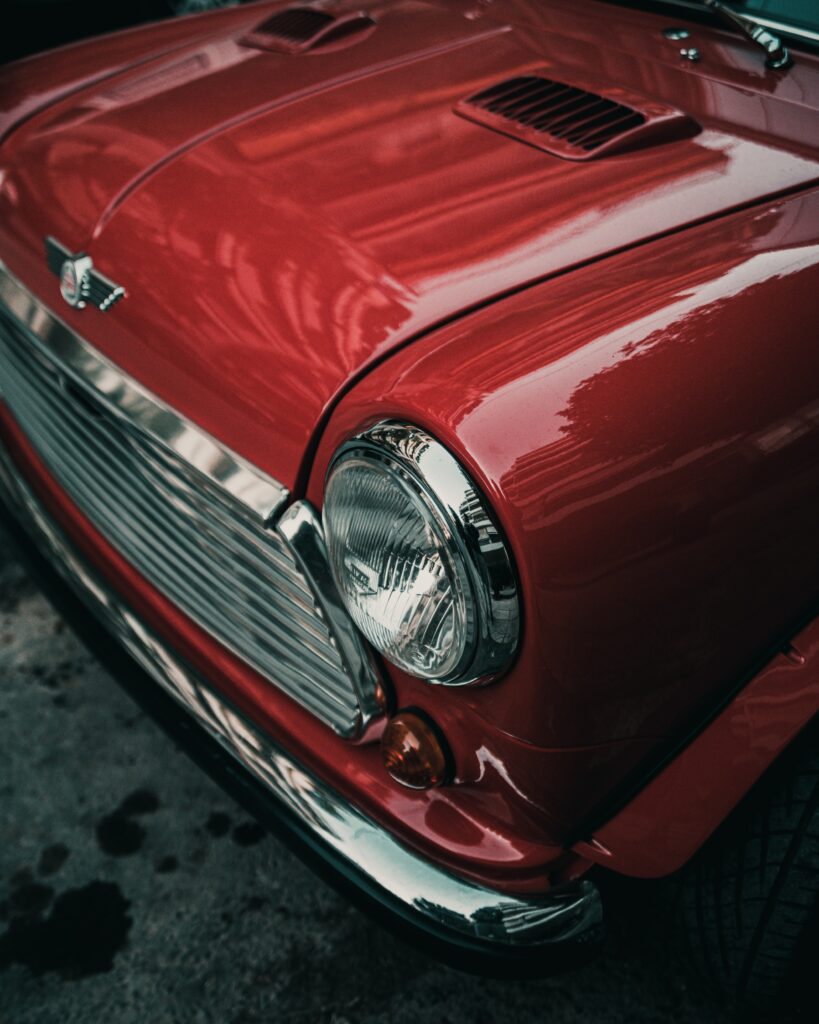 Vintage Red Car Wallpaper: Nostalgic Retro Design & Elegance