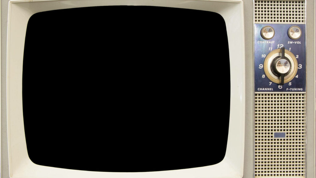 Retrospective Reminiscence: Vintage TV Resting in Silence Wallpaper