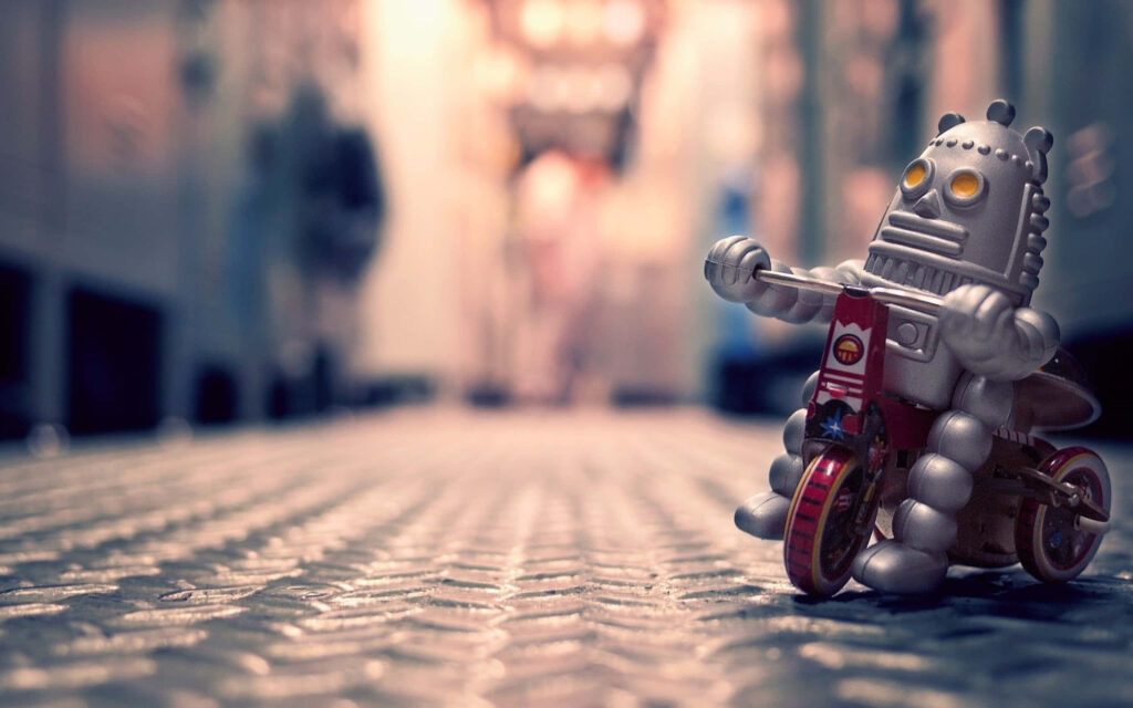 Vintage Robot Toy on Tricycle: Nostalgic Meets Modern Industrial Wallpaper